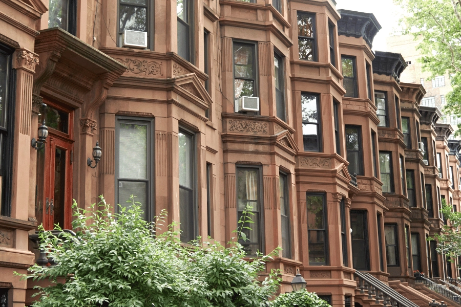 beautiful brownstones homes with lots of windows in a city