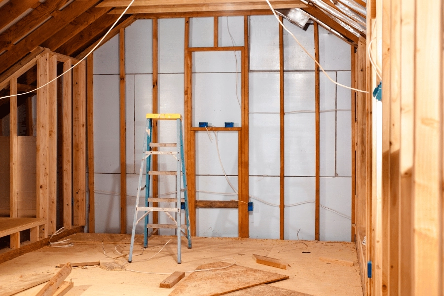 ladder and building materials in new home addition