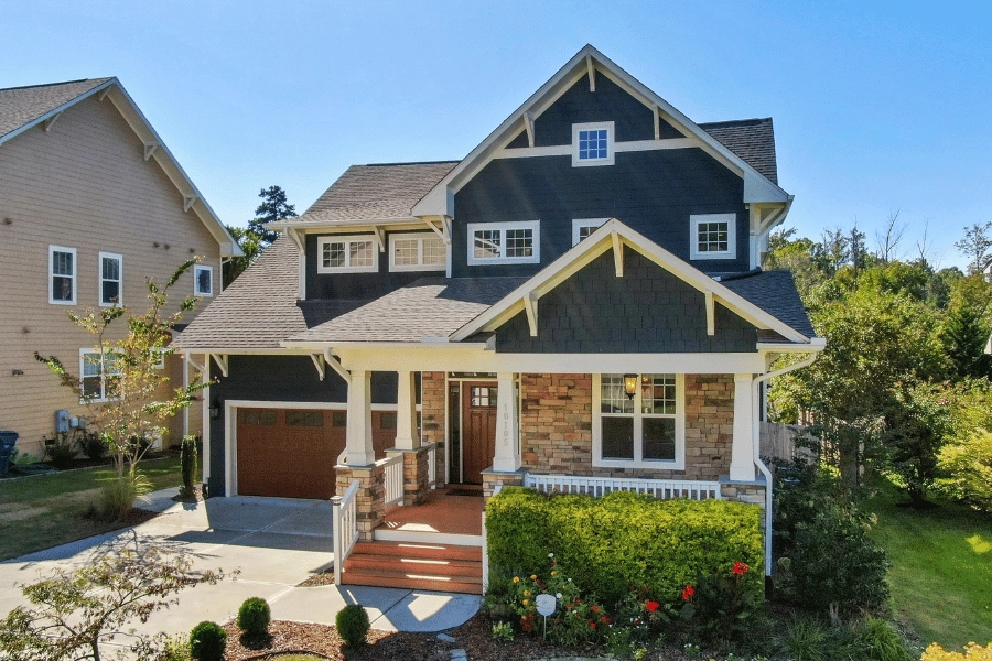 large suburban home with front porch 