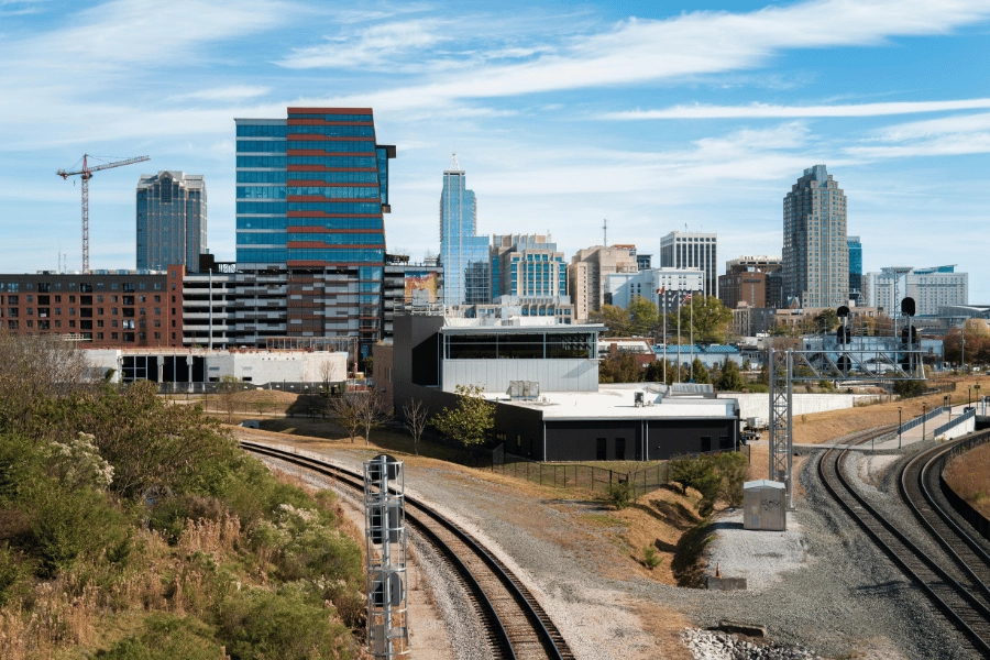 Raleigh, NC, skyline and railroad tracks overlooking the city