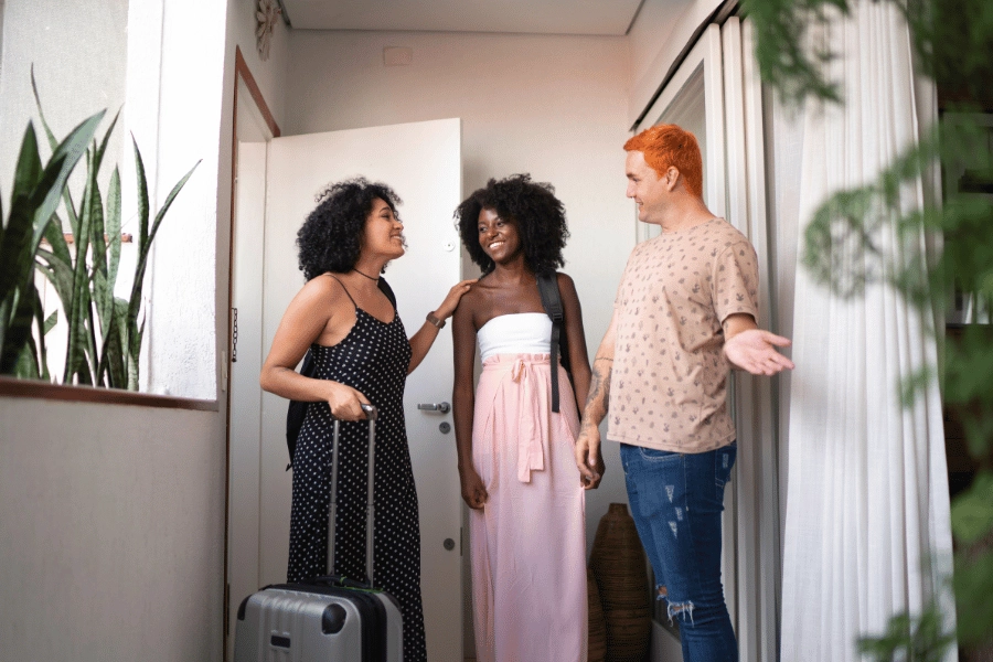 homeowner showing visiting friends the guest house