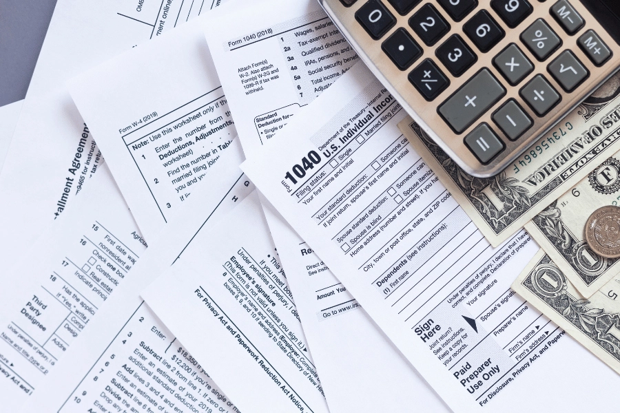 tax forms and calculator in order to calculate taxes and pay them