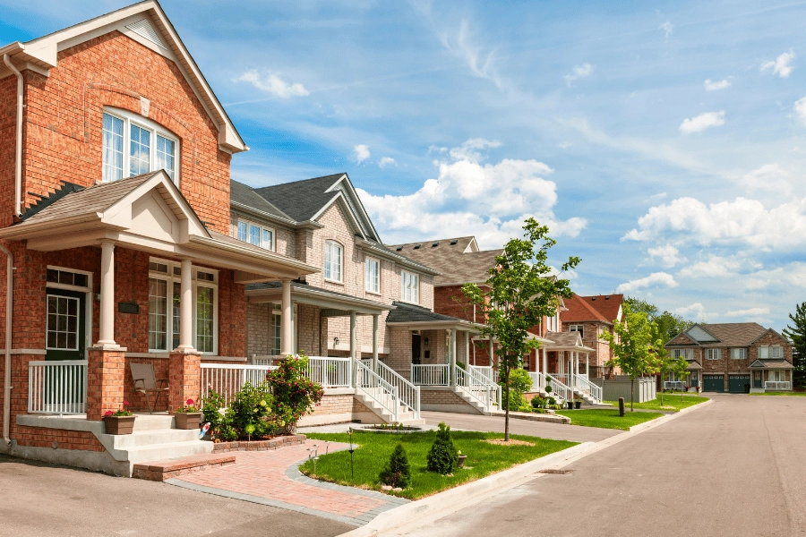 suburbn neighborhood with large houses lining the street