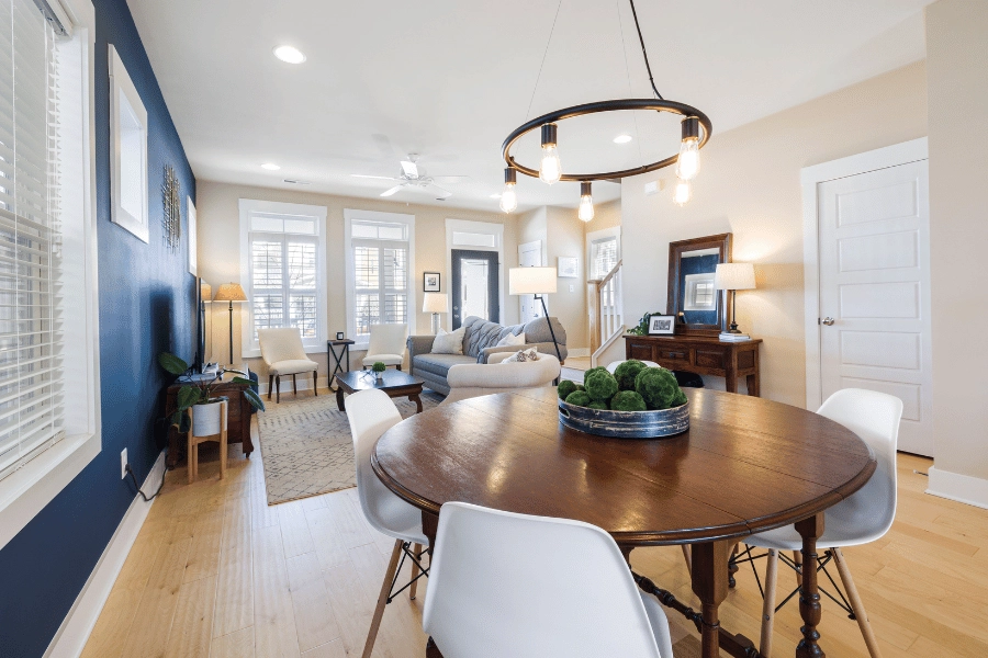 living room and dining table staged in a home for sale
