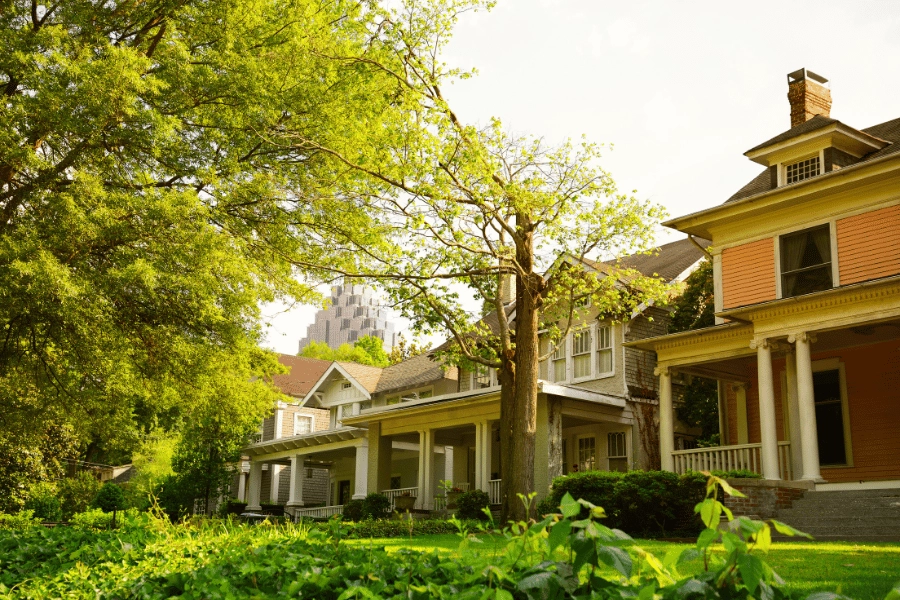 historic homes with large front porches and lots of greenery
