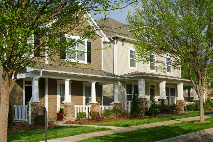 Two homes with front porches in a Raleigh, NC neighborhood